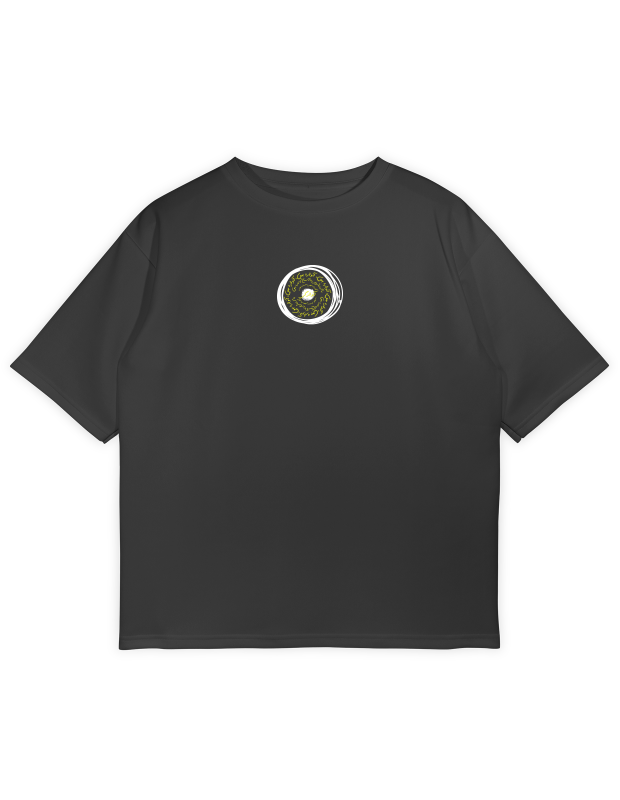 A black oversized t-shirt name "Awaara Hon" with a small, circular, yellow and white abstract design centered on the chest, containing subtle Urdu script.